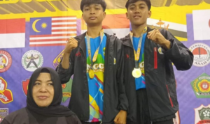 Cavin dan Tian Raih Medali Emas di 2ND Batam Pencak Silat Open Championship 2024 (foto: ist)